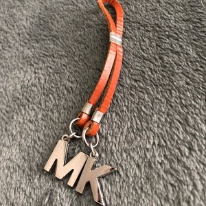 MK logo charm. Perfect condition.
